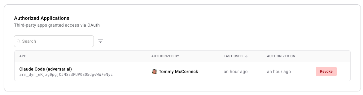 Authorized Applications section on the Team settings page, subtitled 'Third-party apps granted access via OAuth', with a search box and filter control above a single-row table; the row shows an app named 'Claude Code (adversarial)' with its dynamic client ID below the name, the member who authorized it, 'an hour ago' for Last Used and Authorized On, and a Revoke button on the right